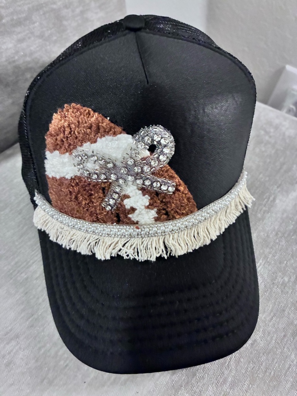 Judith  March - Women’s trucker hat